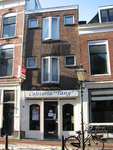 820891 Gezicht op de voorgevel van Cafetaria Tang (Twijnstraat 19) te Utrecht.